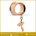 Stainless Steel Gold plated Dangle Key Double Flared Ear Tunnel